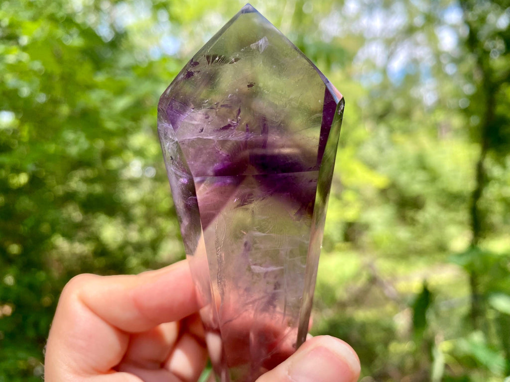 Bahia Amethyst Wand with Phantoms: Polished Brazilian Crystal Point. Spectacular tool ideal for reiki and energy work in general.